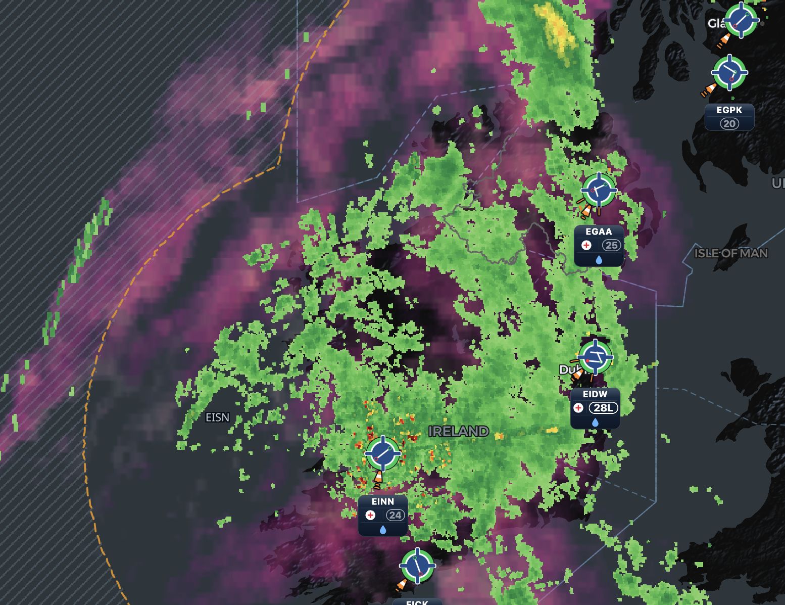 The same map in night mode: dark background, precipitation recalibrated to green and magenta.
